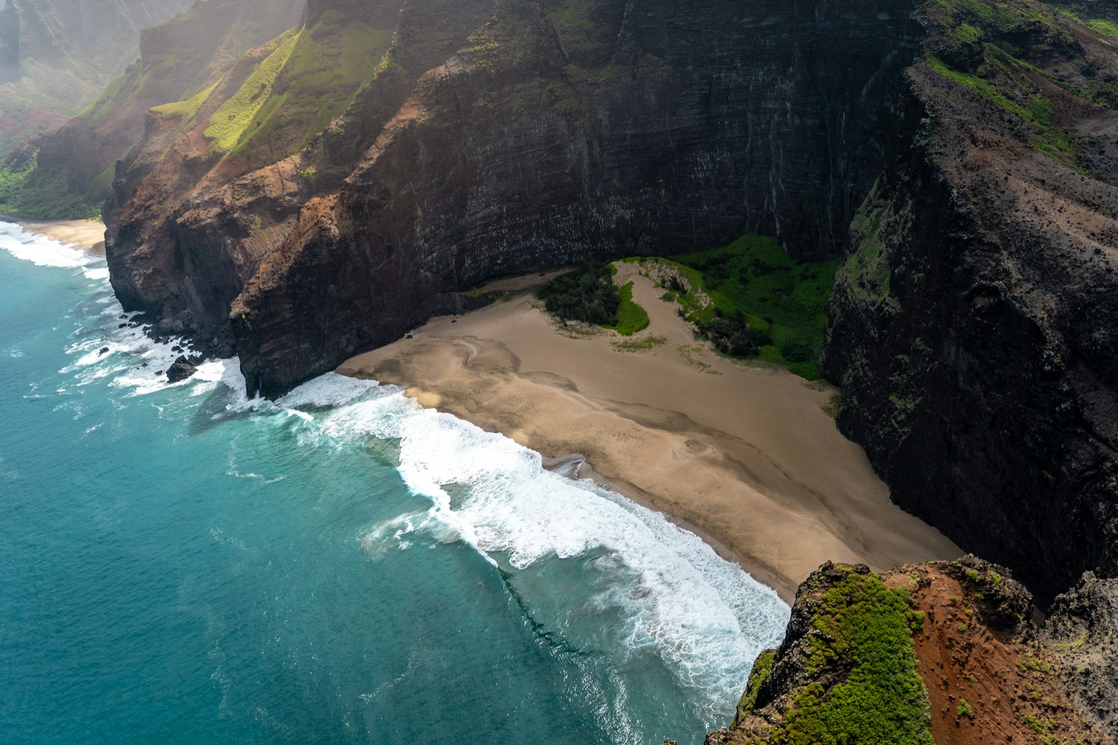 Volcanic mountain meeting the ocean in Hawaii