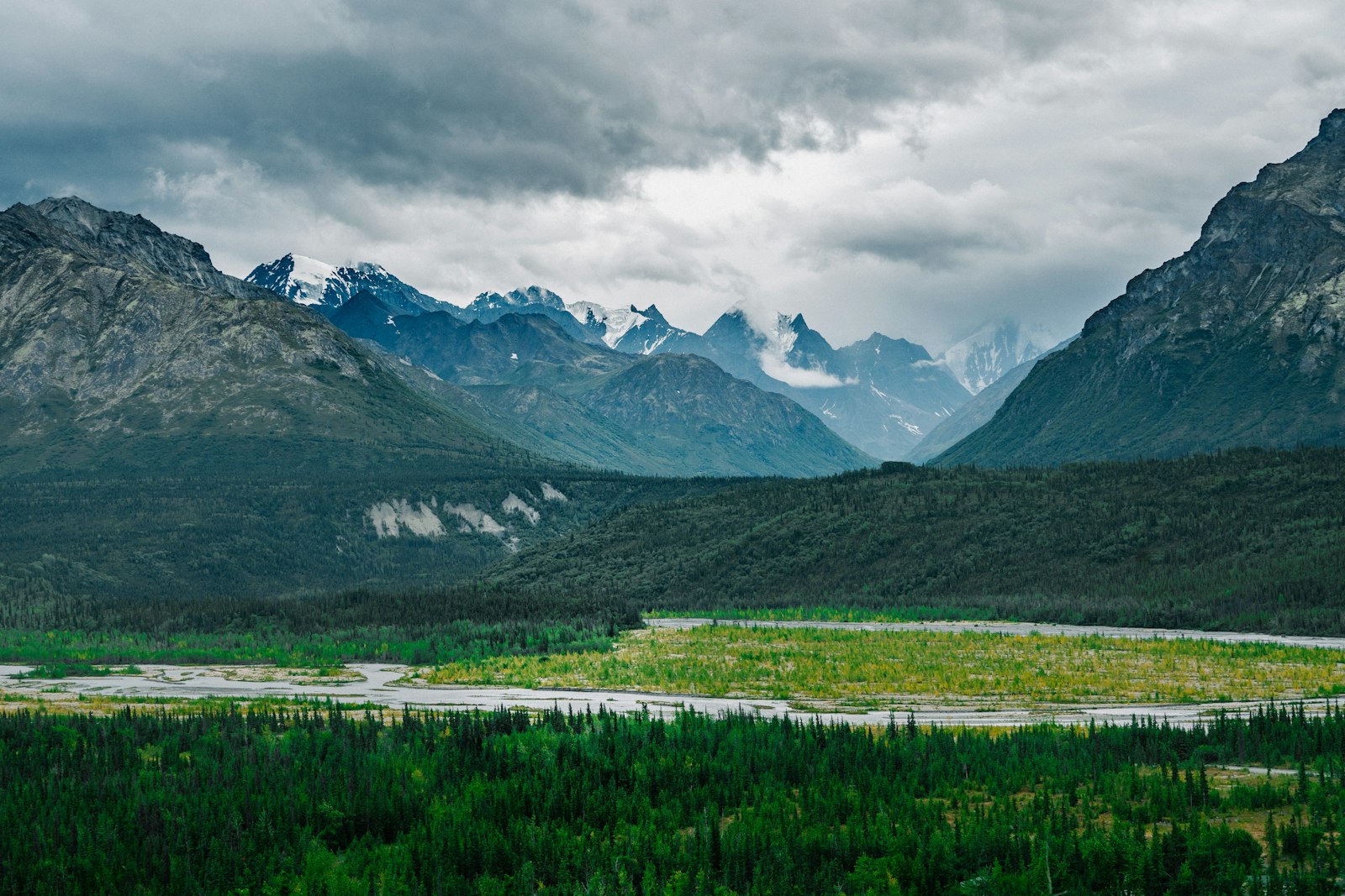 Dramatic snow-covered mountains and wilderness in Alaska